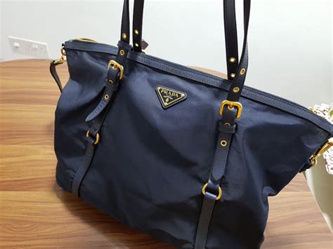 prada tessuto clutch|Prada nylon shoulder bag price.